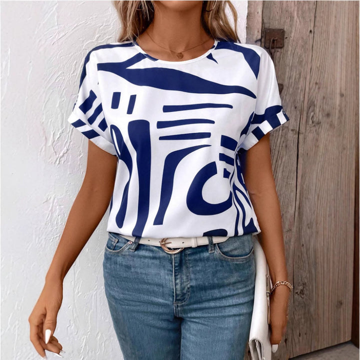 Solara™ – geometric-print batwing blouse