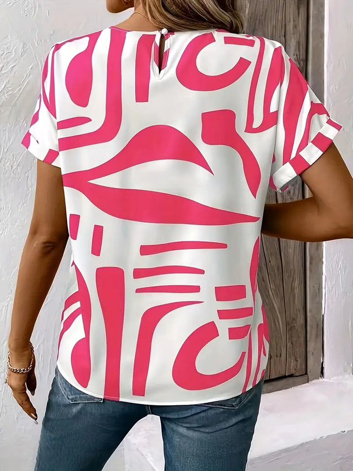 Solara™ – geometric-print batwing blouse