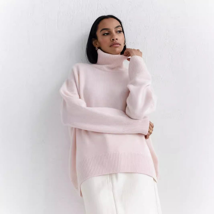 women wearing a light pink turtleneck sweater against a white background.
women’s mock neck sweater, cozy pullover, soft knit top, casual women’s sweater, everyday mock neck pullover, lightweight knit top, comfortable women’s sweater, relaxed fit mock neck, versatile women’s knitwear, stylish cozy top

